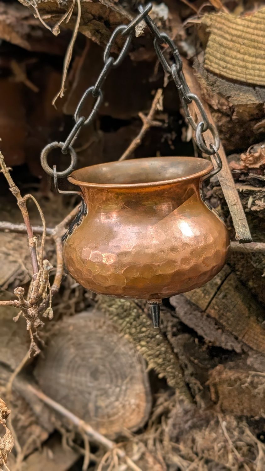 Small copper colored cauldron
