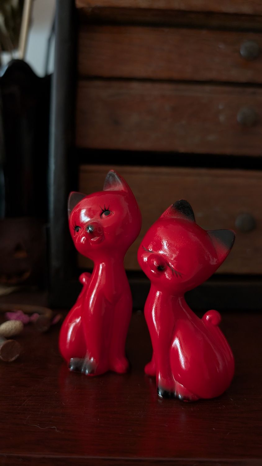 Two little red devil mid century cats