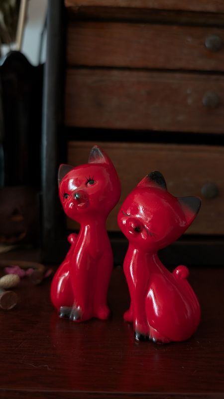 Two little red devil mid century cats
