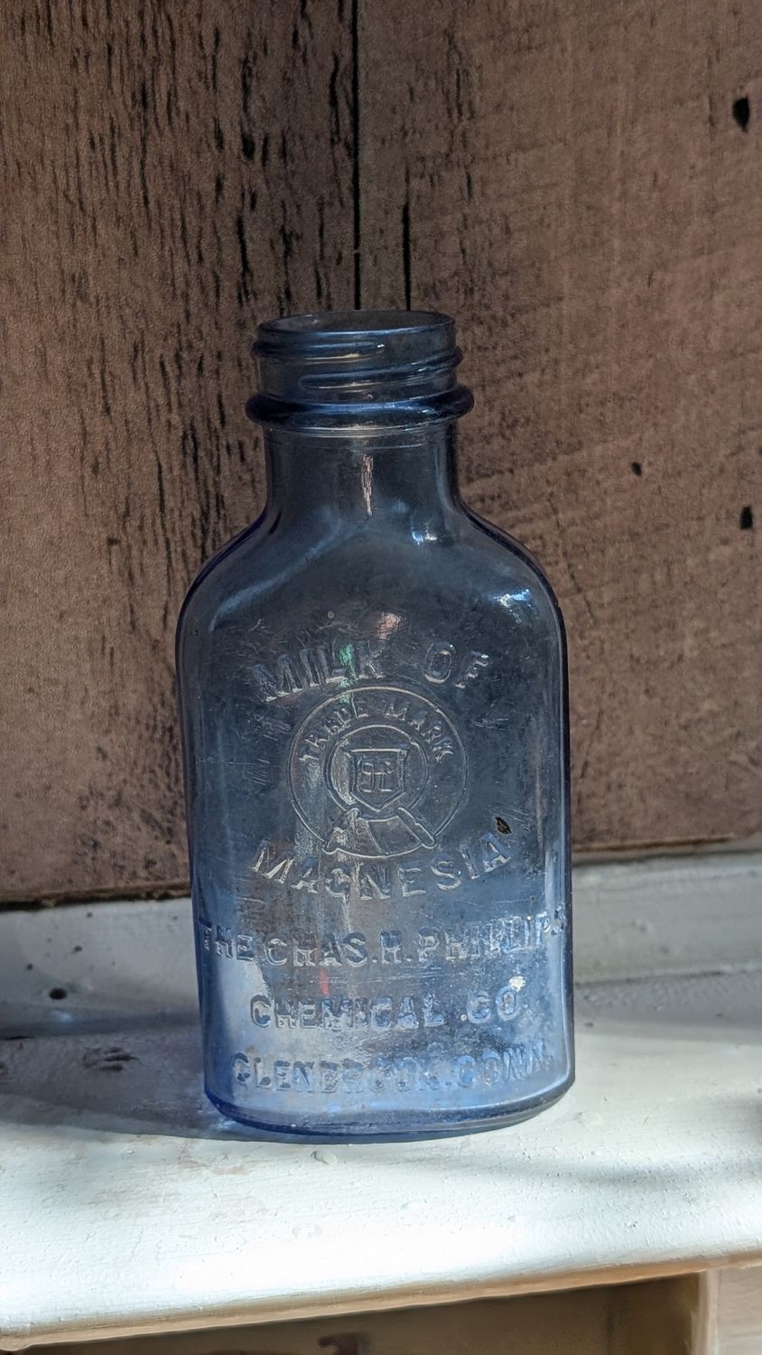 Milk of magnesia blue vintage bottle