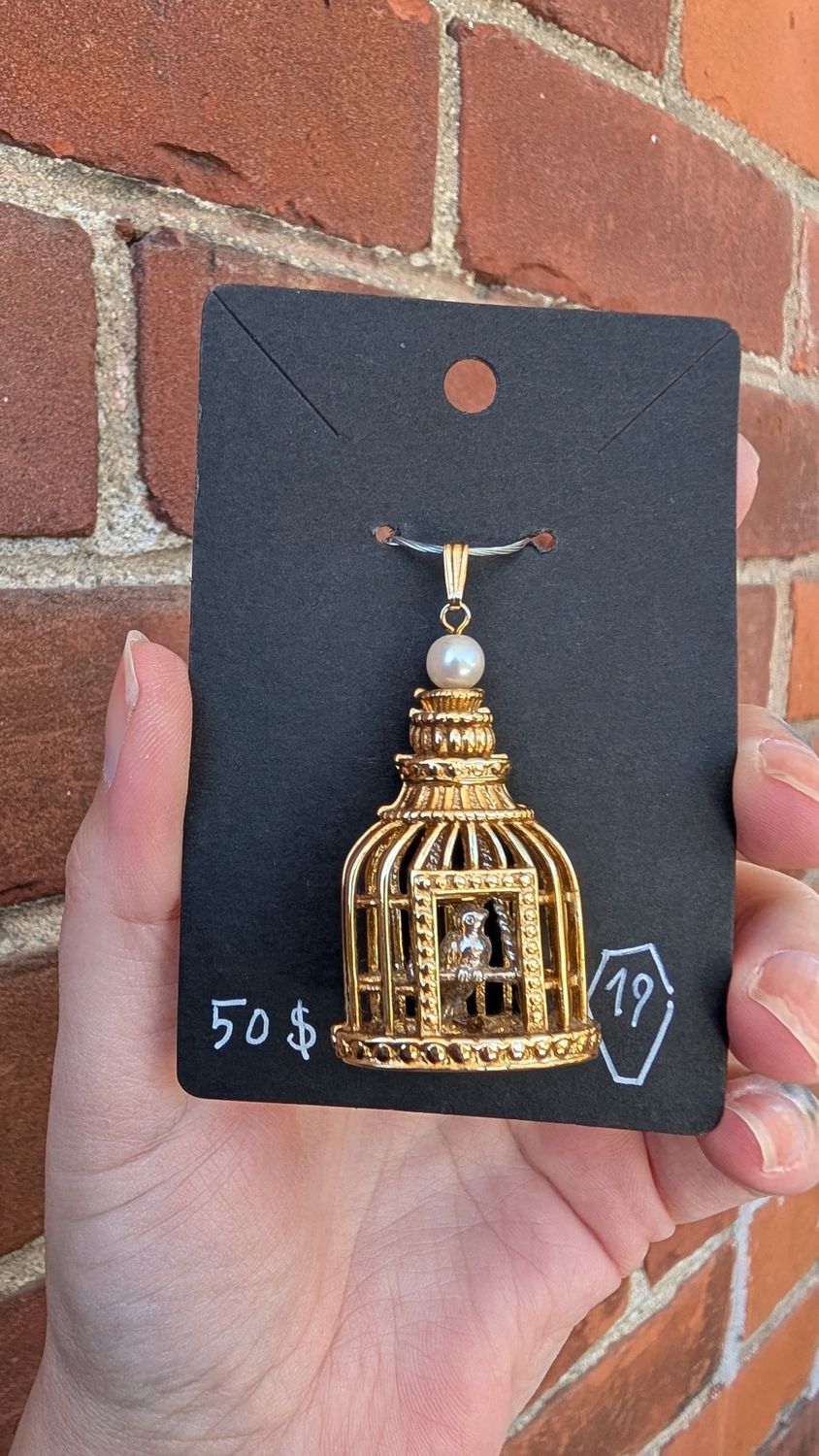 Caged bird pendant by Avon