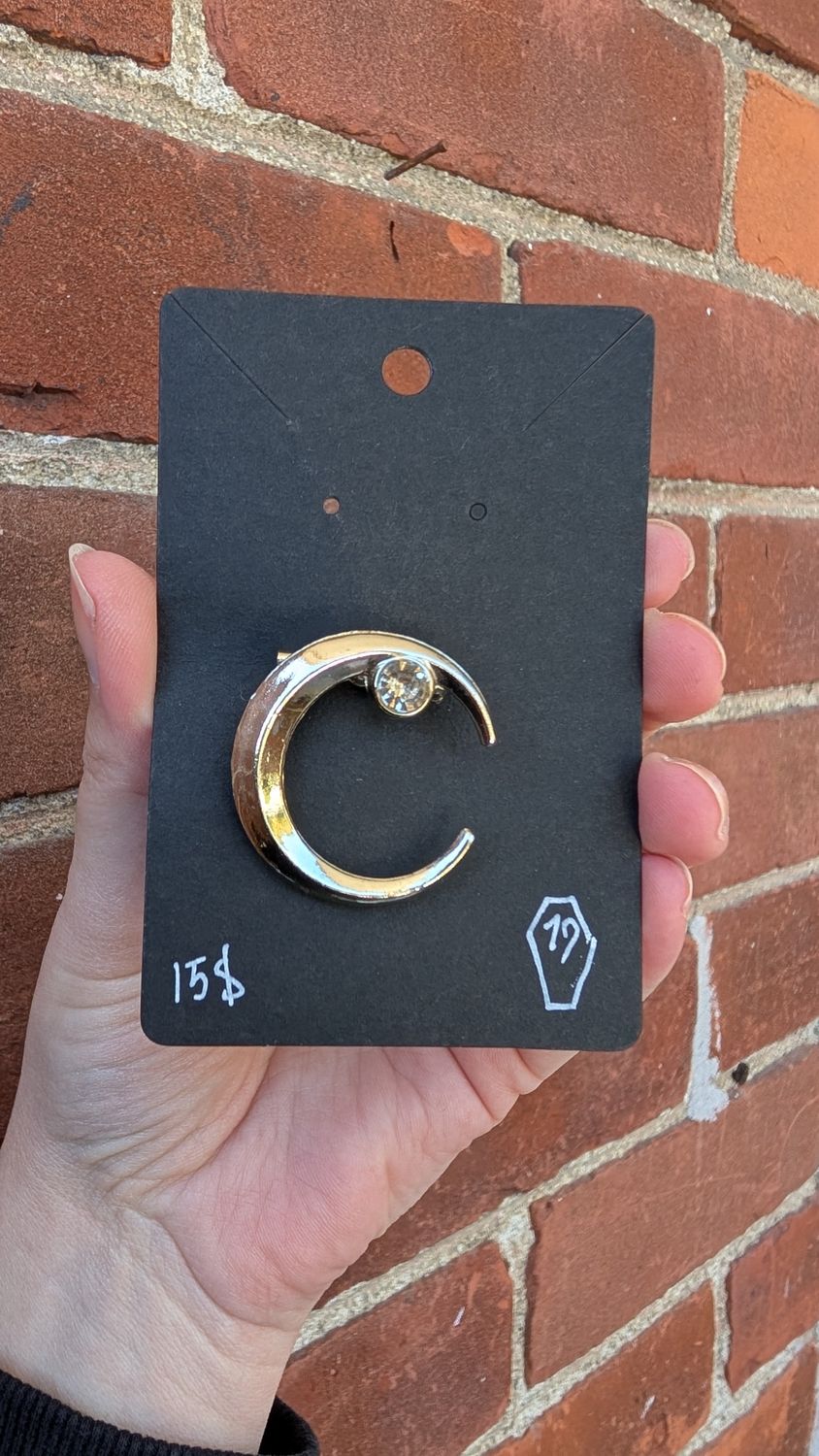 Moon with gem brooch