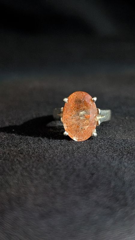 Faceted sunstone sterling silver ring in size 5