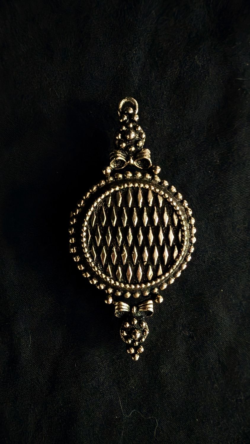 Vintage solid perfume locket gold colored in victorian style