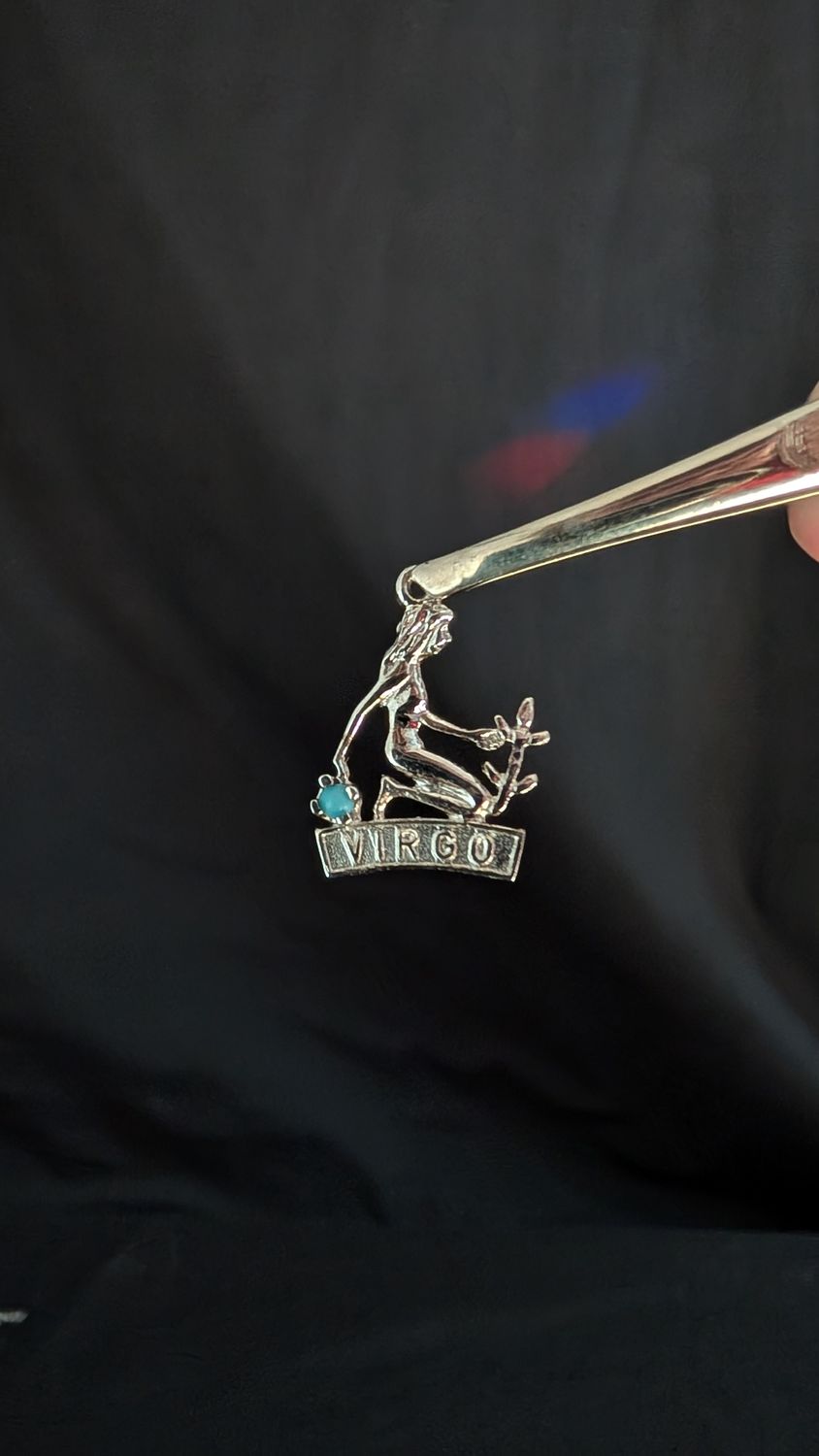 Virgo sterling silver pendant with blue turquoise sapphire colored gemstone