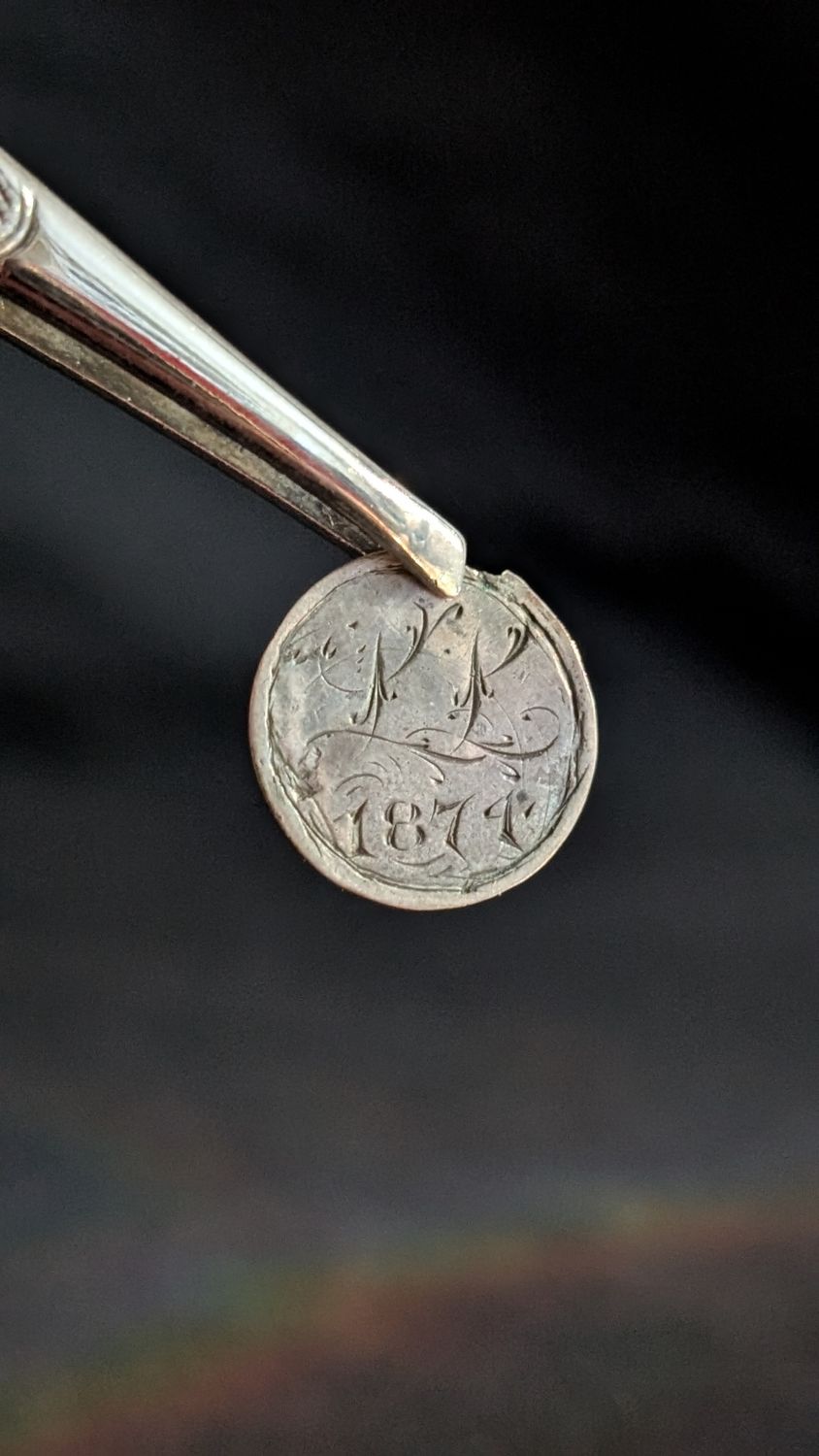 1874 love token with initials L L silver coin