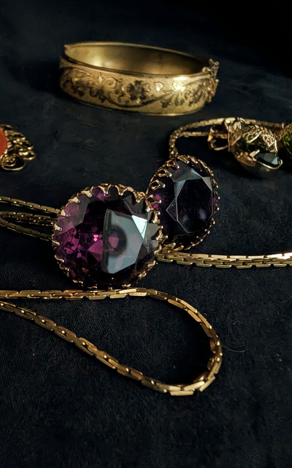 Big purple gold toned twist back earrings