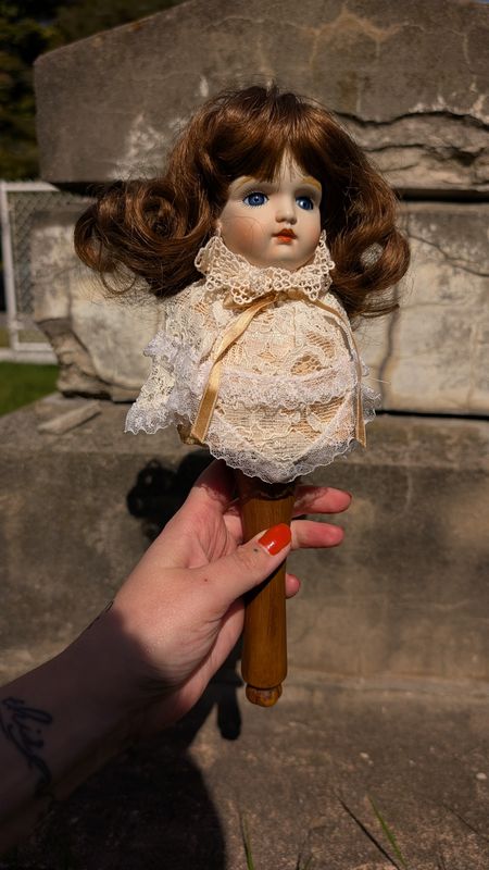 Porcelain musical doll head on wood stick  - plays Fur Elise