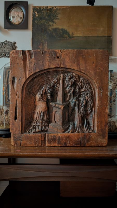 Carved wood panel - grief