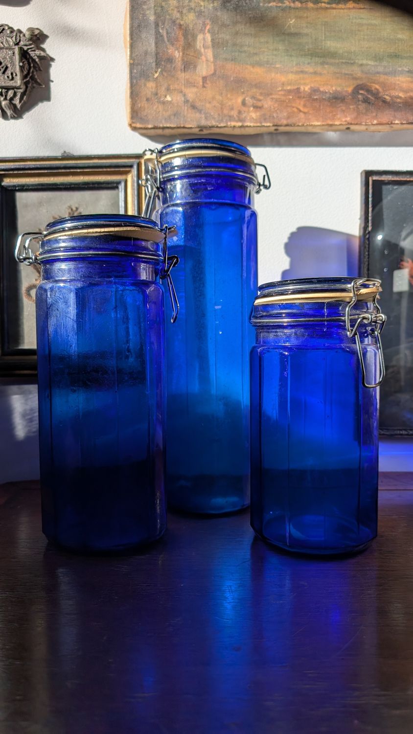 Set of three cobalt blue glass containers