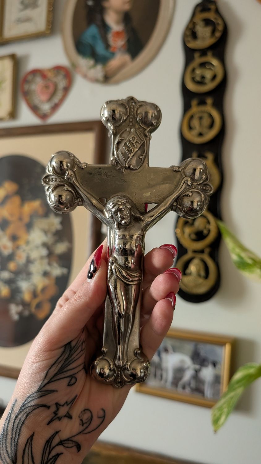 Small silver ornate crucifix