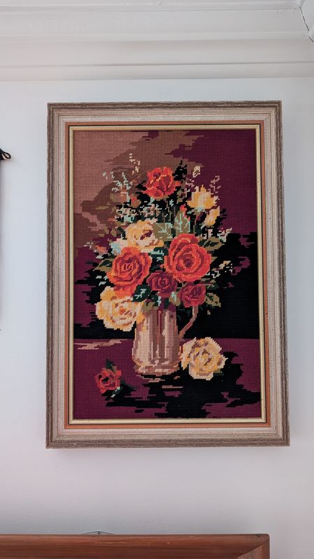 Nature morte needle point in orange and red tones