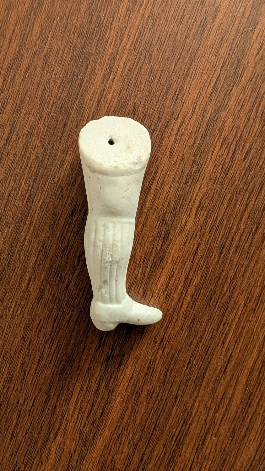 Bisque doll leg
