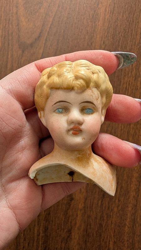 Cherub like porcelain head