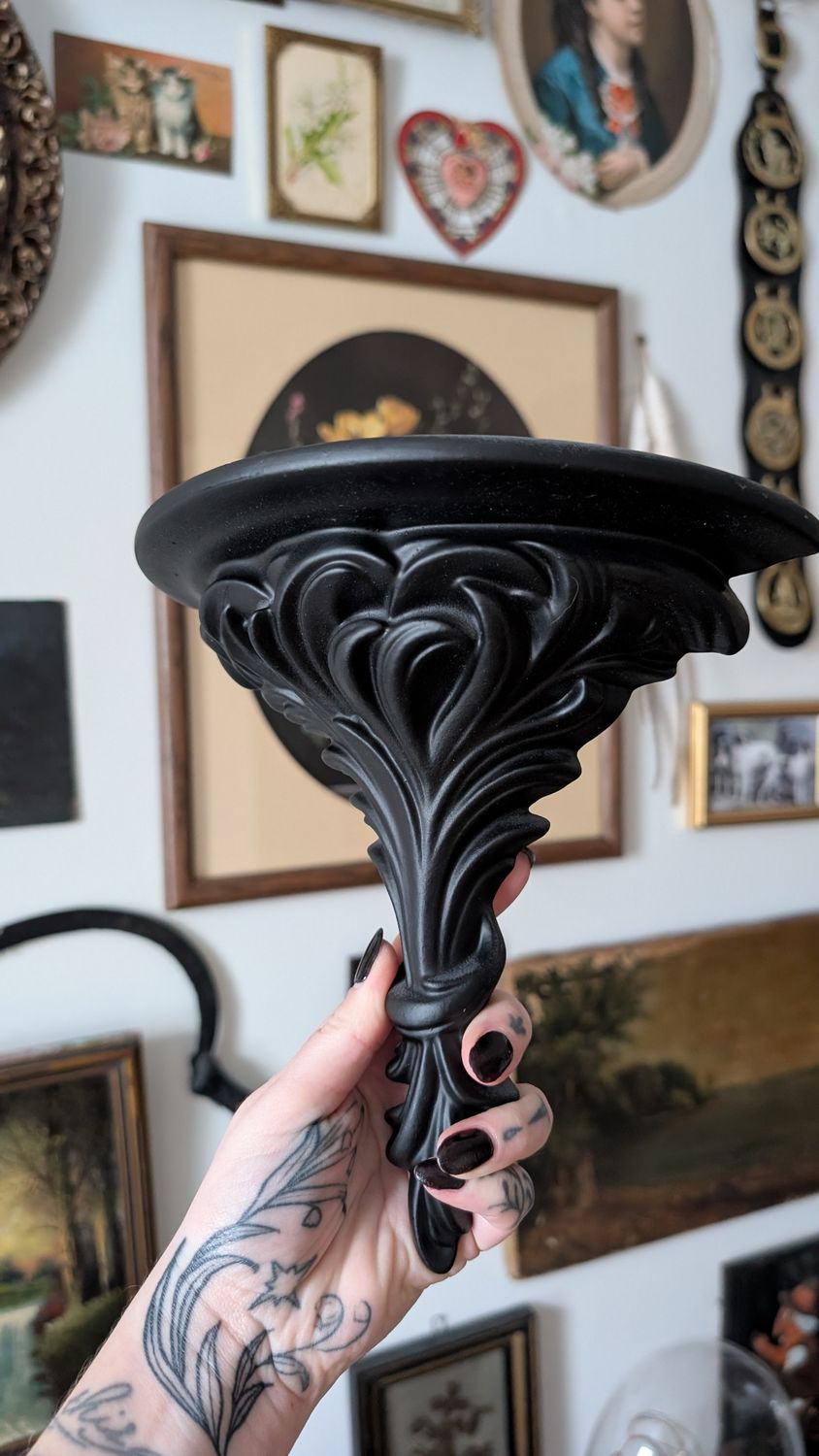 Black porcelain ormate shelf