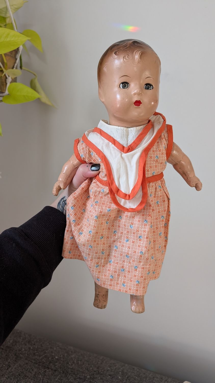 Small sleeper antique doll