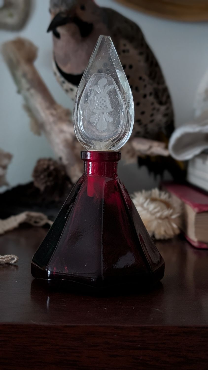 Red glass perfume bottle