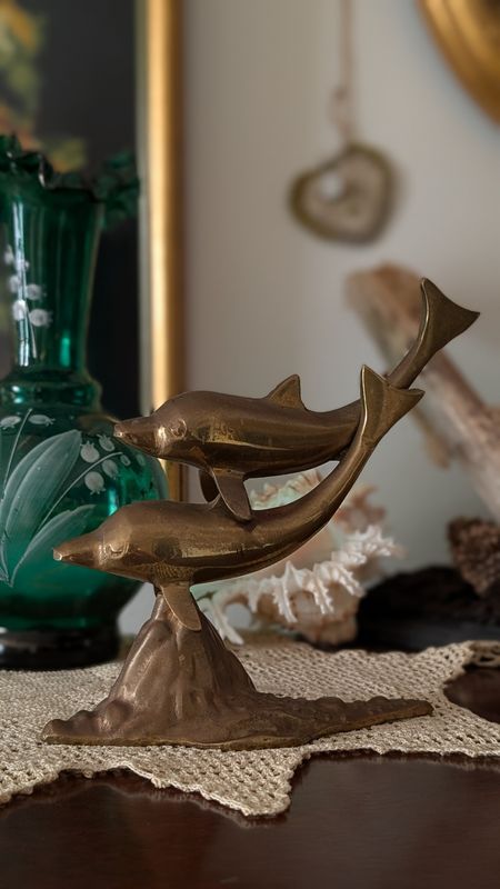 Brass dolphins
