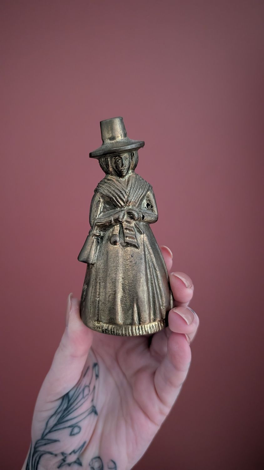 Puritan lady brass bell