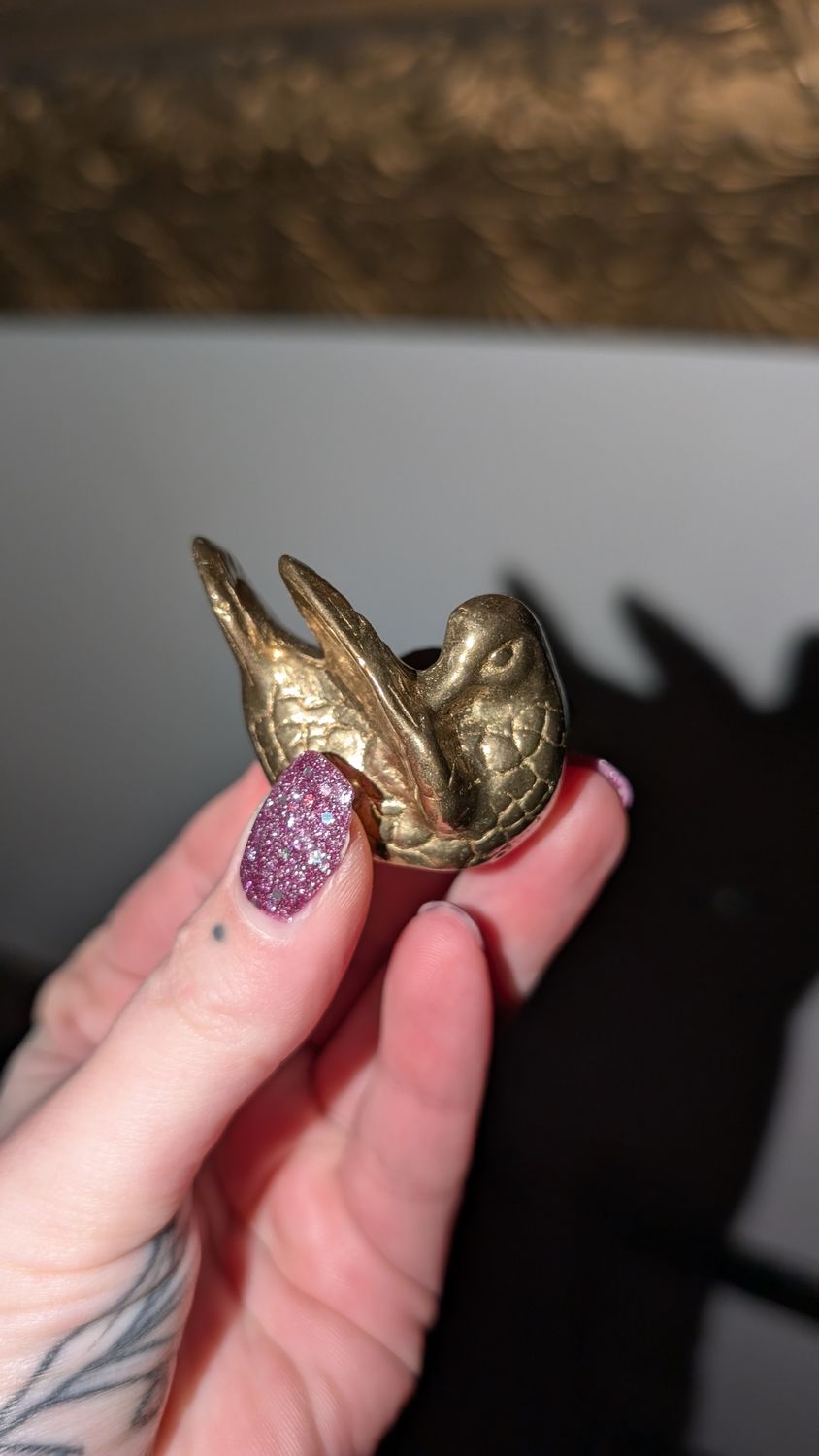 Miniature brass bird