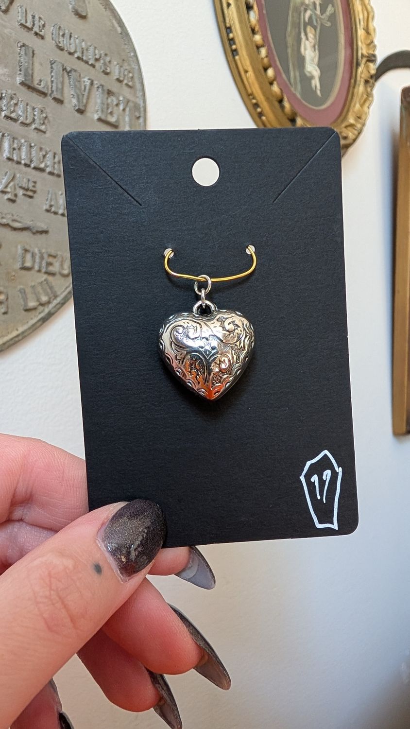 Small silver tone 3d heart pendant