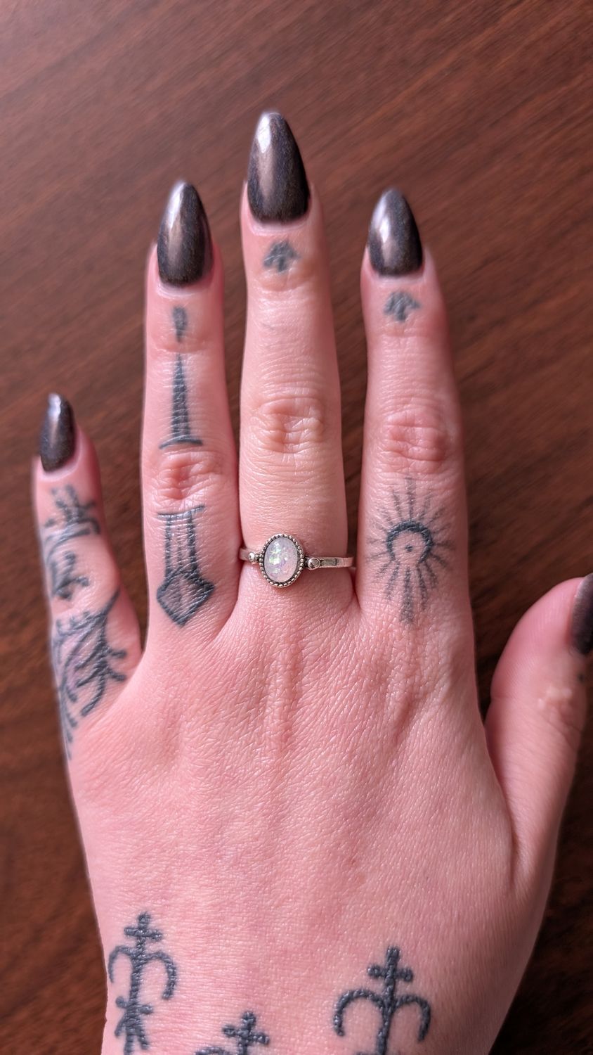 Round white conferti faux opal silver tone ring