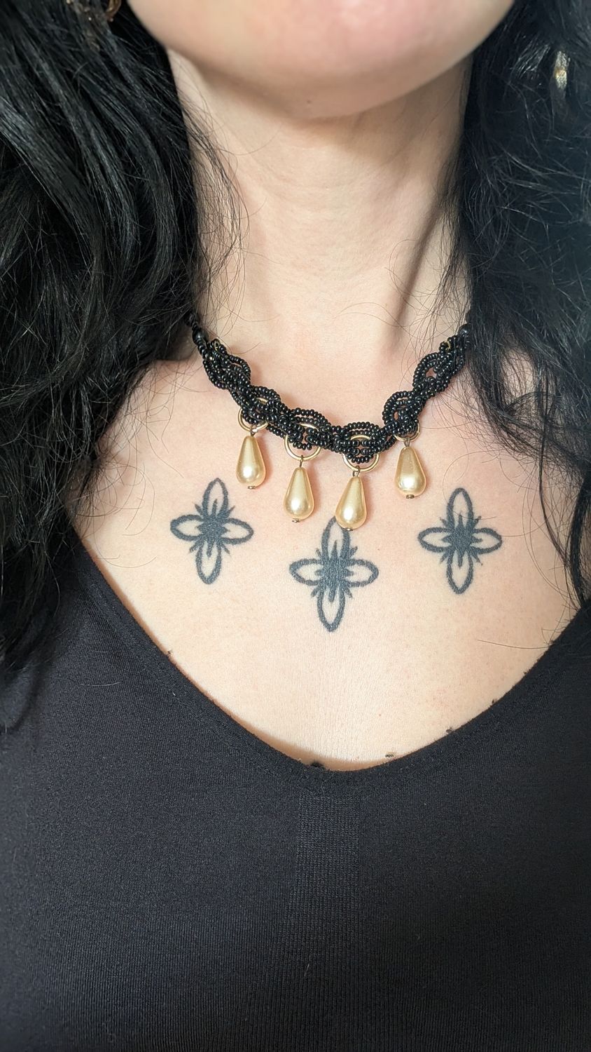 Black beads and faux pearl necklace