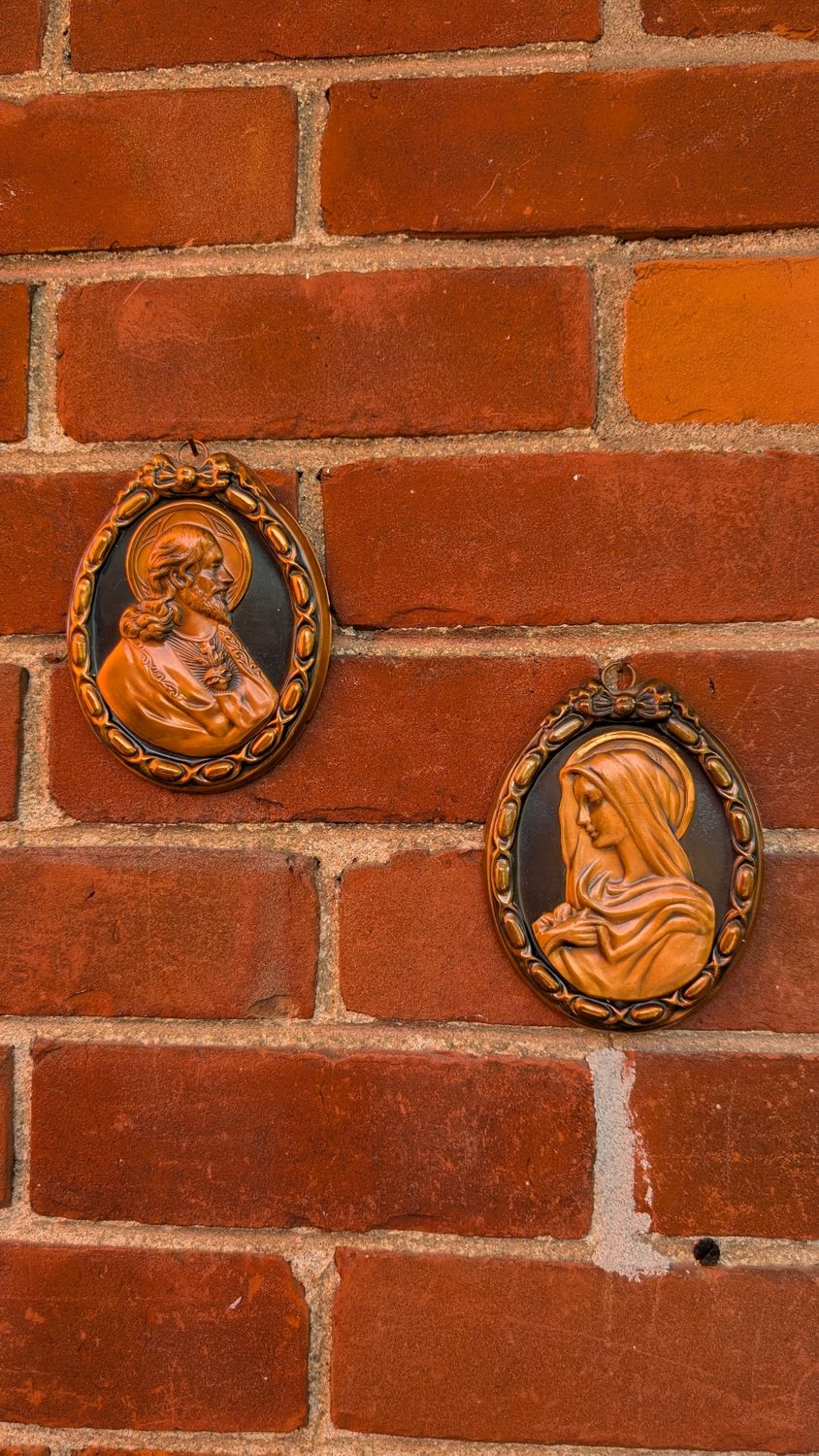 Copper jesus and mary wall plaques
