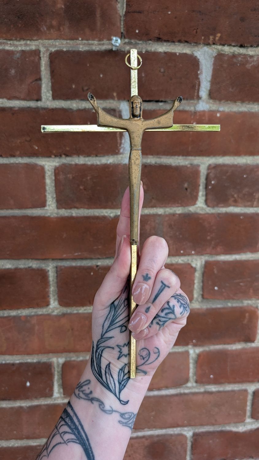 Thin metal crucifix