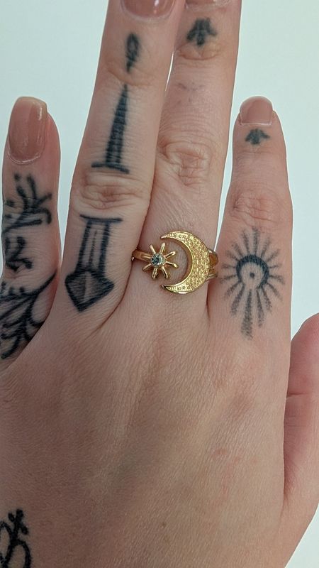 Celestial gold tone ring moon and star