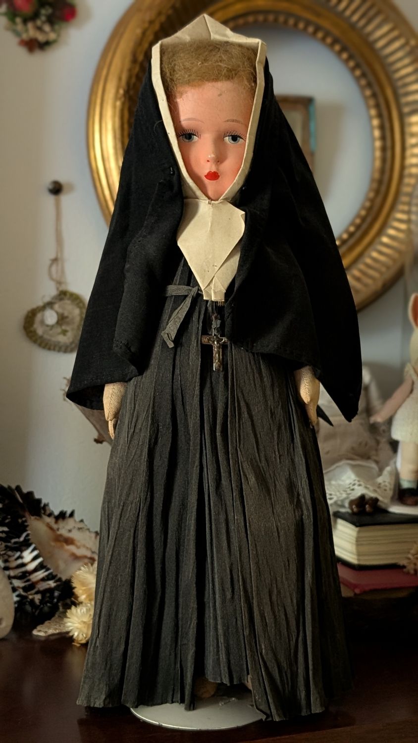 Antique french 1880s papier maché nun doll with crepe paper dress