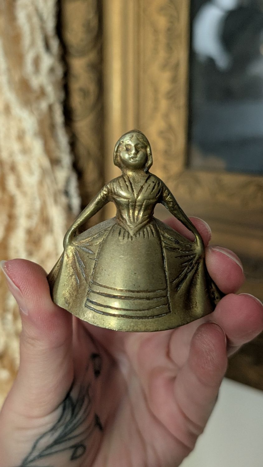 Curtsying maiden brass bell