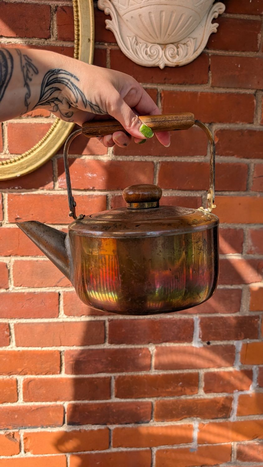 Decorative rustic copper kettle with patina