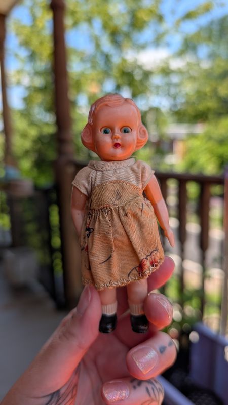 Small plastic doll