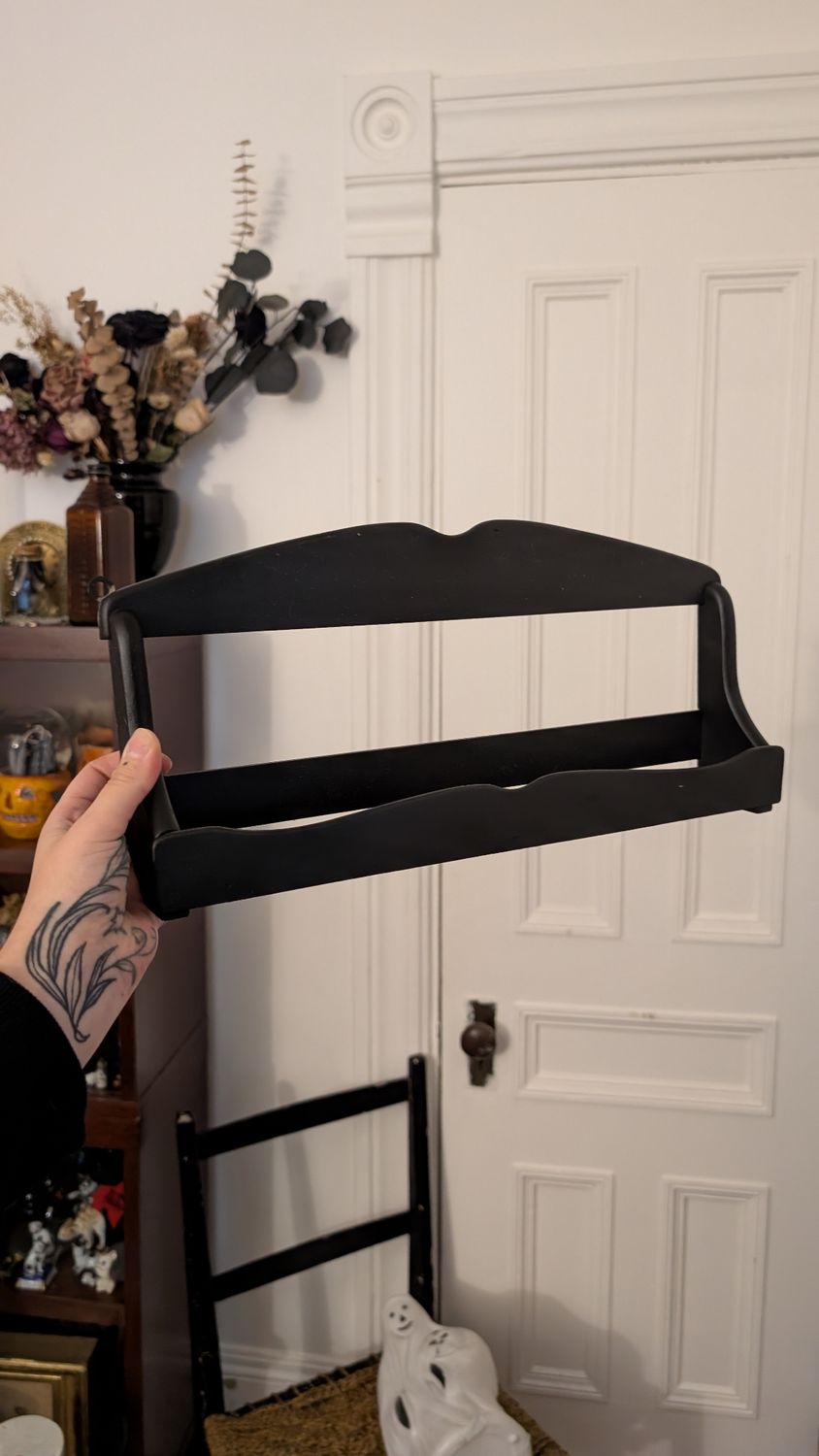 Small black curio shelf
