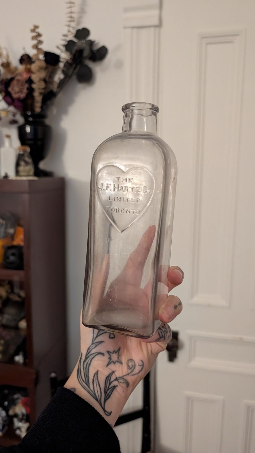 Clear medical bottle with heart logo - toronto