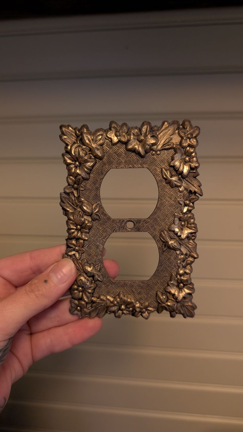 Ornate outlet plaque gold tone