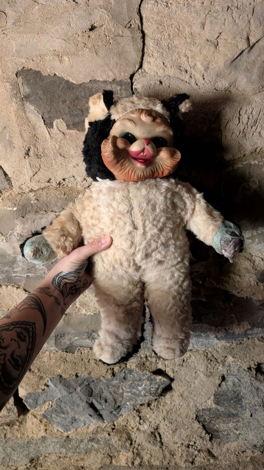 Puss in boots vintage plush toy skunk