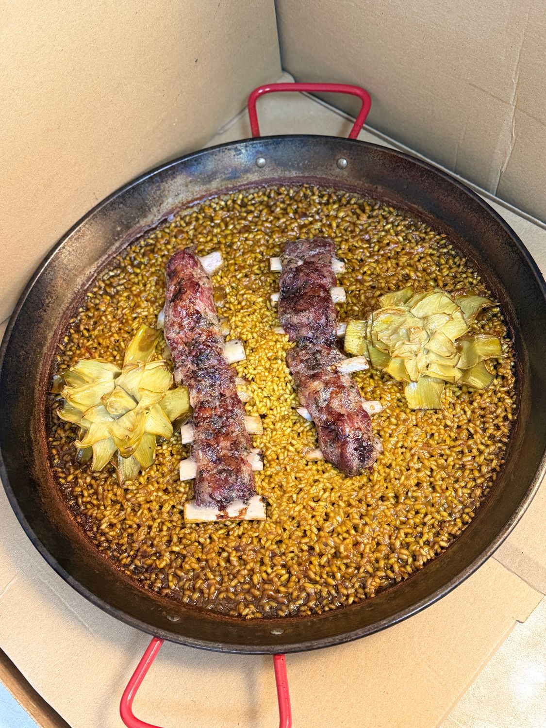 Arroz de costillas ibéricas y alcachofas p/r 24,00€