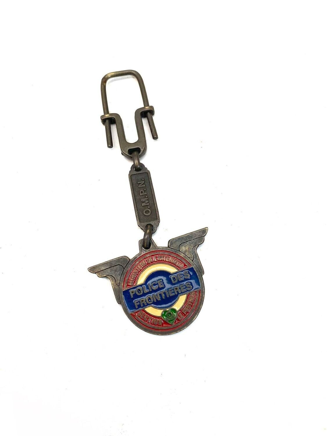 Badge/porte clé o.m.p.n police des frontiere