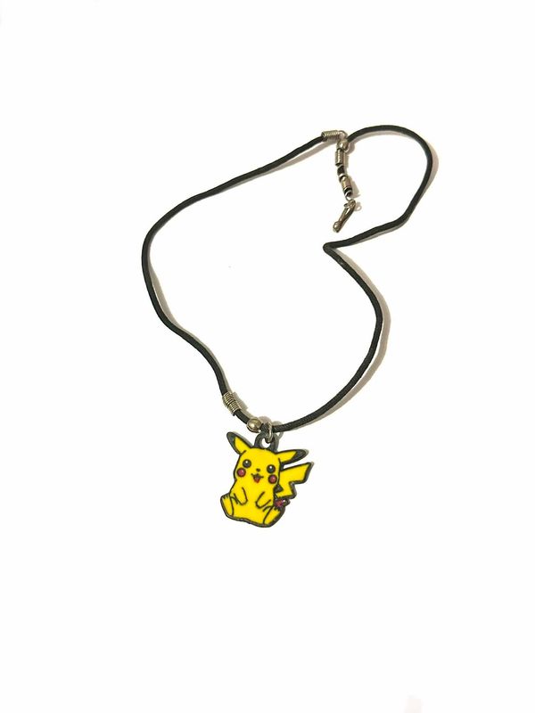 Ancien collier pendentif pokémon année 99/2000
