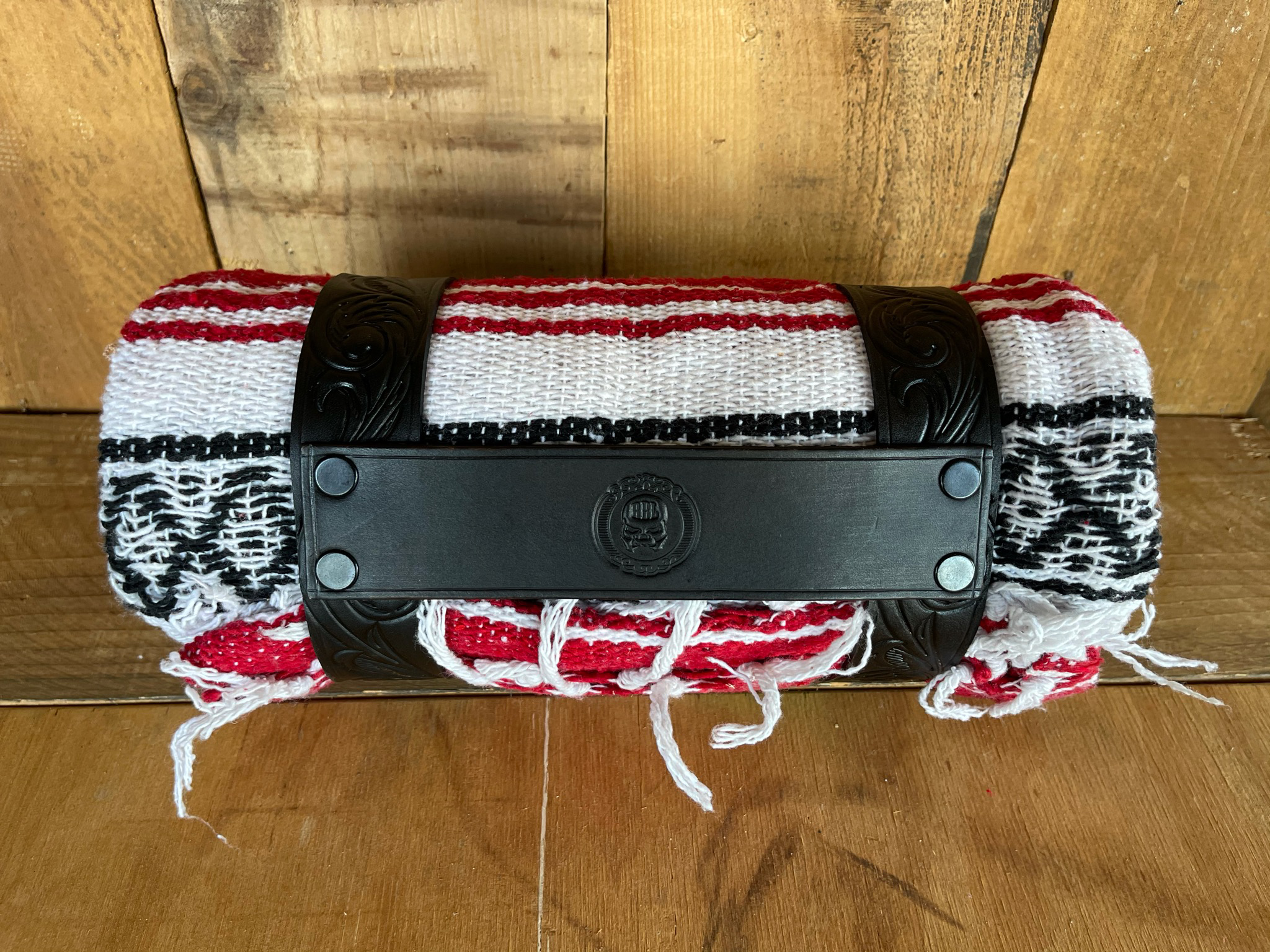 Filigree blanket roll straps