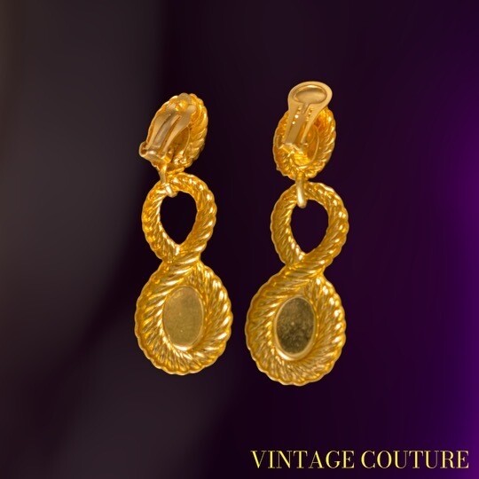 Unsigned earrings 132