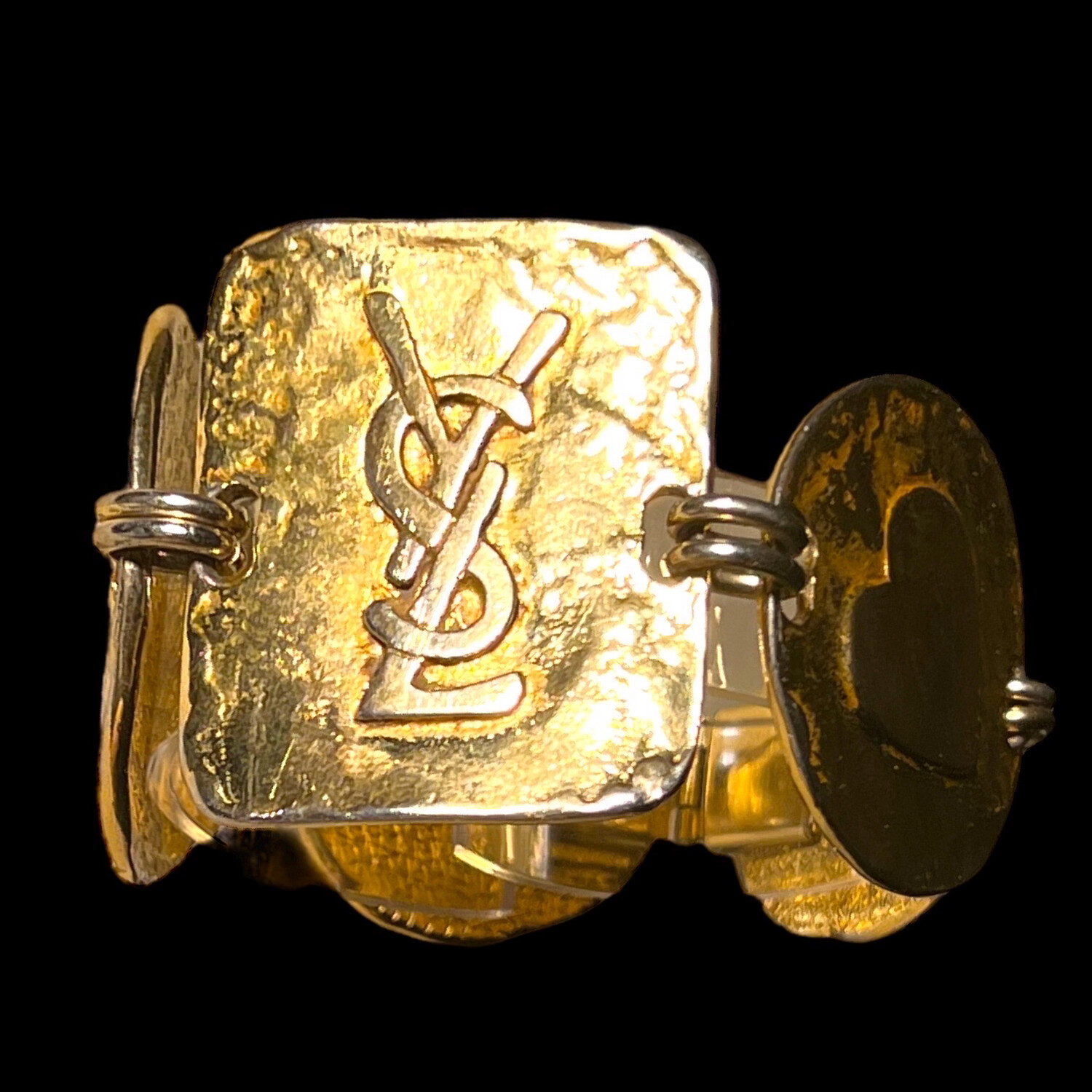 Bracelet vintage tout en laiton Yves saint Laurent 