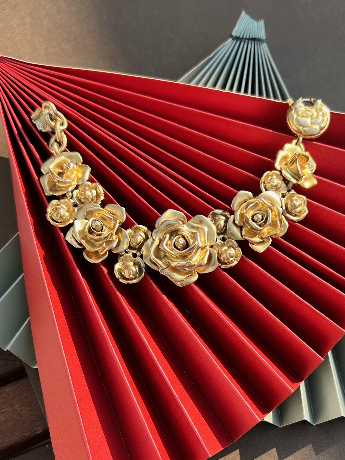 Vintage bracelet Yves Saint Laurent a bunch of rose in golden metal