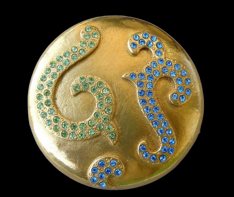 Vintage Yves Saint-Laurent crystal arabesques brooch on brass round