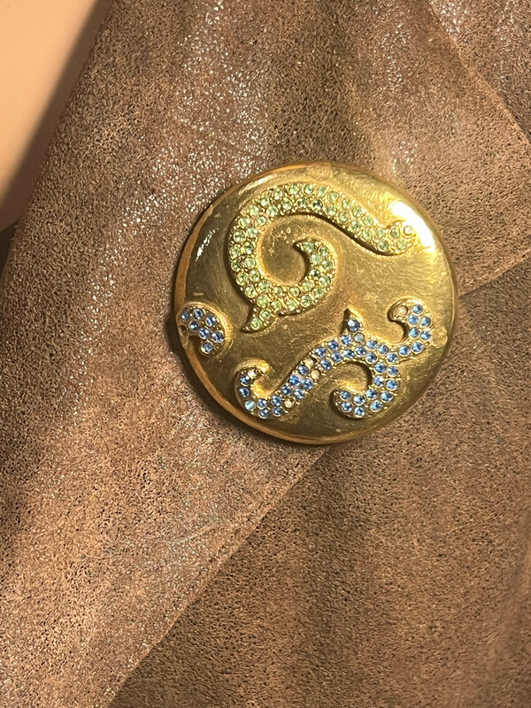 Vintage Yves Saint-Laurent crystal arabesques brooch on brass round