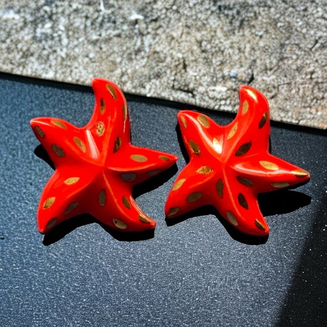 Vintage earrings signed Yves Saint Laurent, red resin