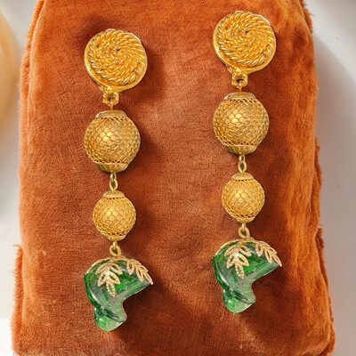Boucles d’oreilles oversize vintage, métal doré et verre de Murano, non signées