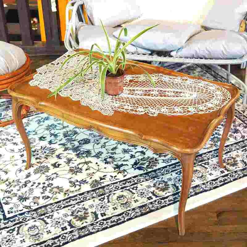 Table basse bois pieds travaillés
